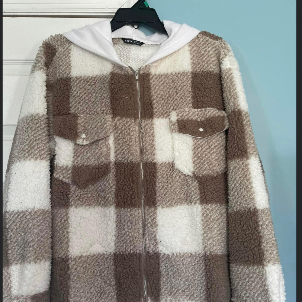 This is a large jacket fits more like a medium